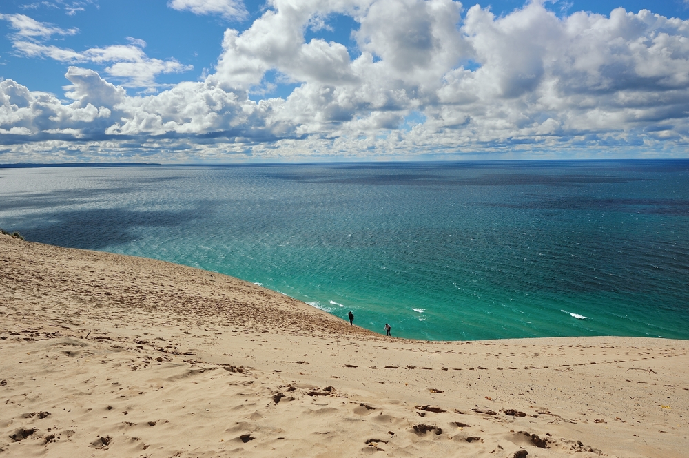 Sleeping Bear National Lakeshore sandy beach with gorgeous green waters, one of the best beaches in Michigan.