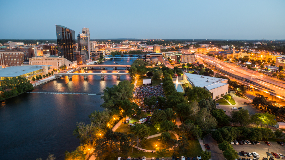 Ariel view of Grand Rapids, a Chicago day trip, illuminated at sunset.