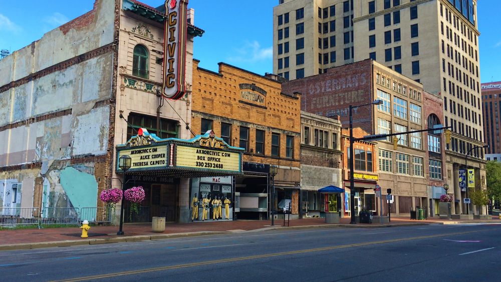 Dilapidated haunted place in Ohio , the Akron Civic Theatre, with intact marquis on road in Akron.