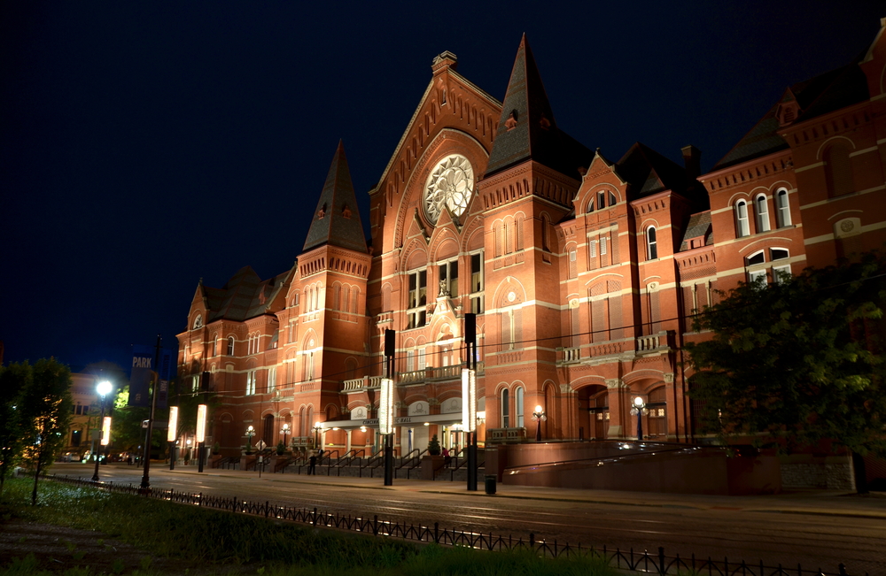 Ornate Gothic-inspired Cincinnati Music Hall exterior at night.