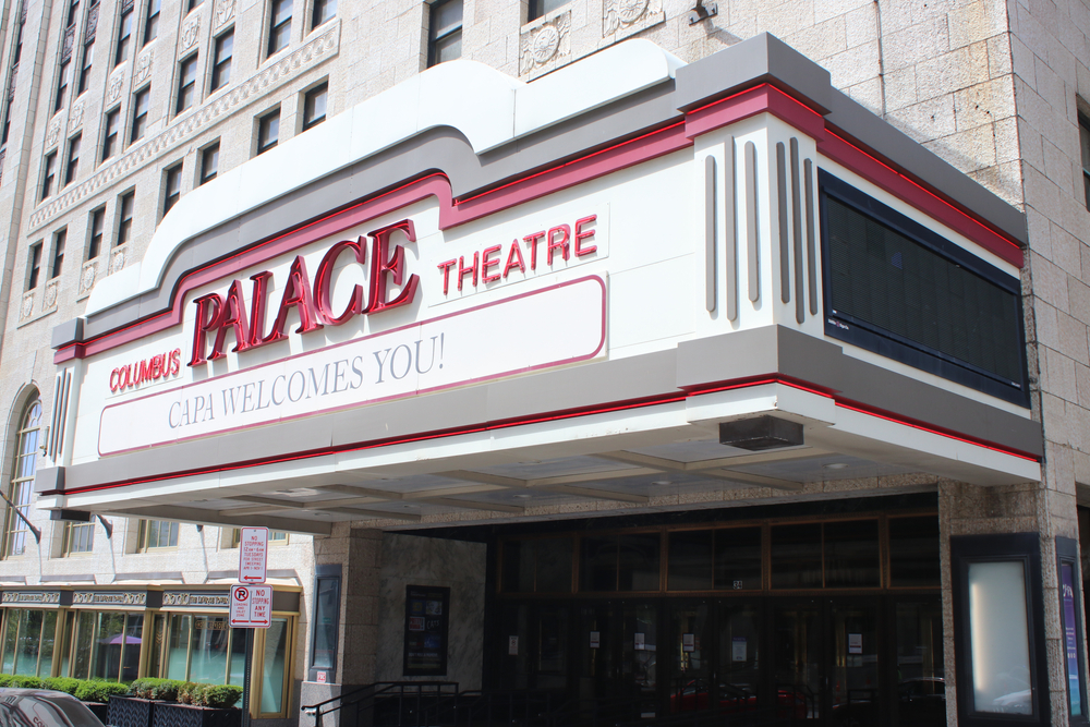 Seances have been held at the haunted Palace theater in Columbus Ohio. Photo of white marquee with red letters.