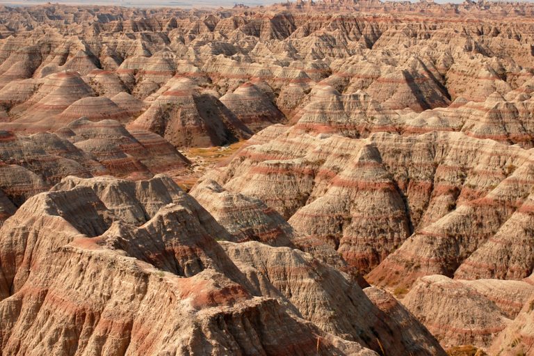 Beige and red rocks of the Badland's Midwest Weekend getaway.