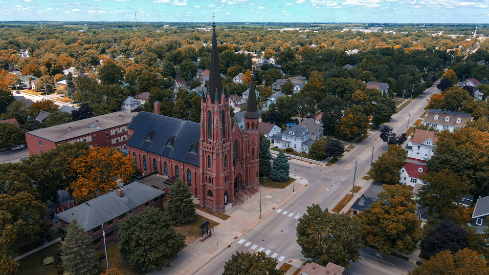 Aerial view downtown Minnesota town with Gothic cathedral in center