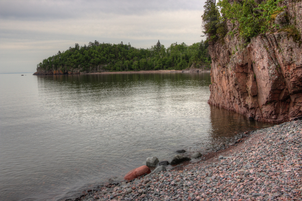 Rocky beach and shoreline along Lake Superior Minnesota small town.