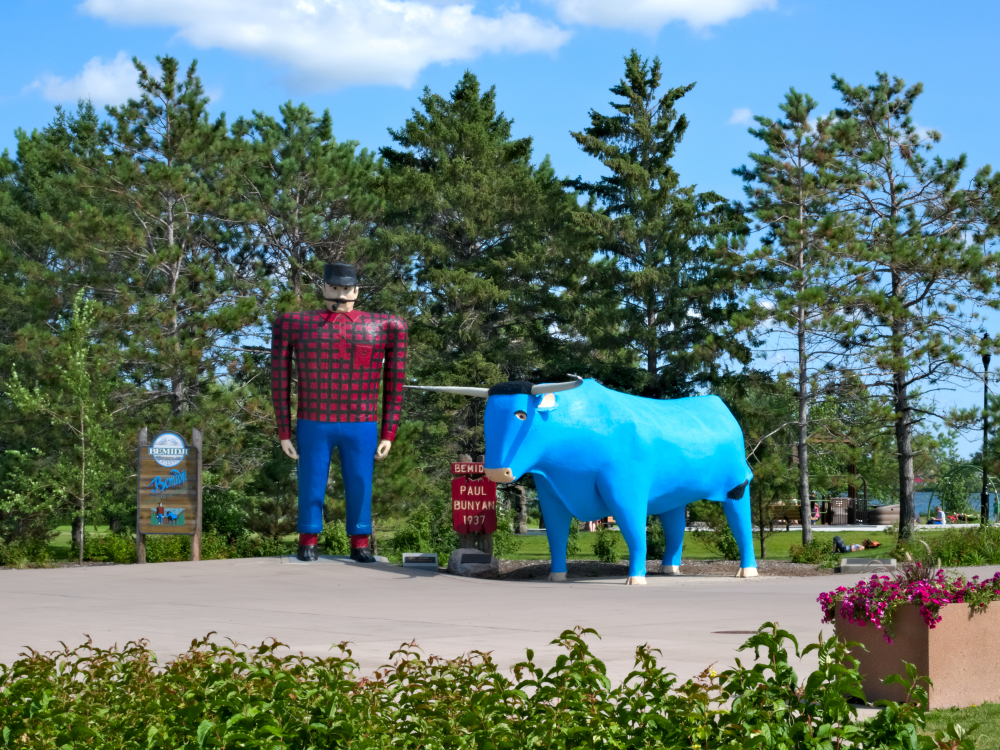 Oversize statues of Paul Bunyan and his blue ox small town Minnesota.