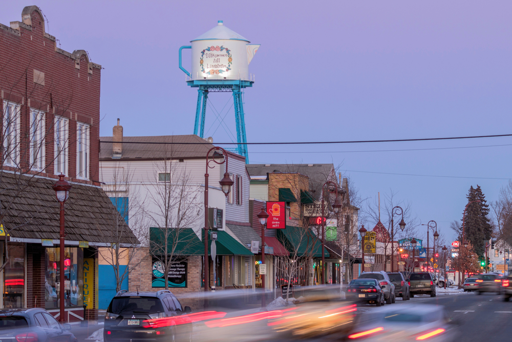 Small Minnesota town main street with unusual tea cup water tower. 