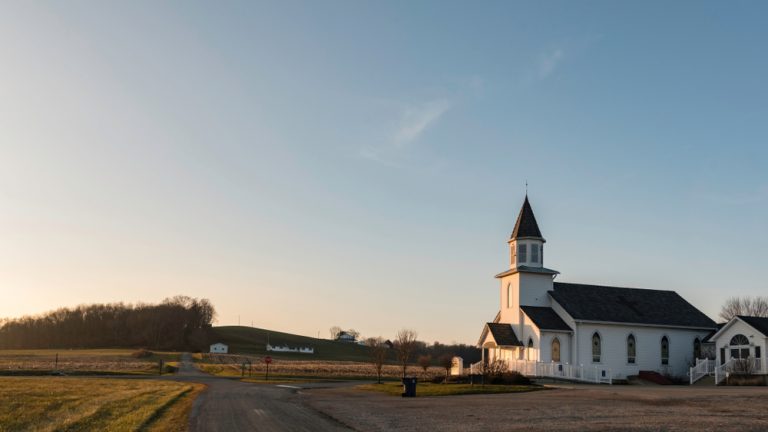 Rural white church with steeple in a small town Ohio, Glenford.