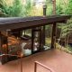 Midwest Airbnb in Ohio modern glass cabin surrounded by trees
