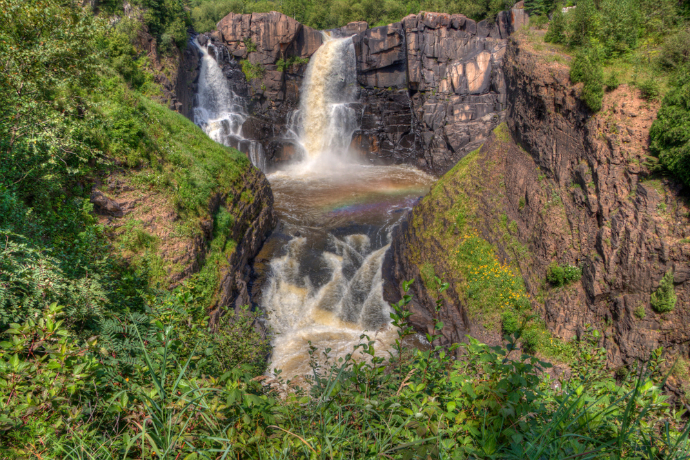 high falls in grand portage minnesota two large waterfalls over a cliff side