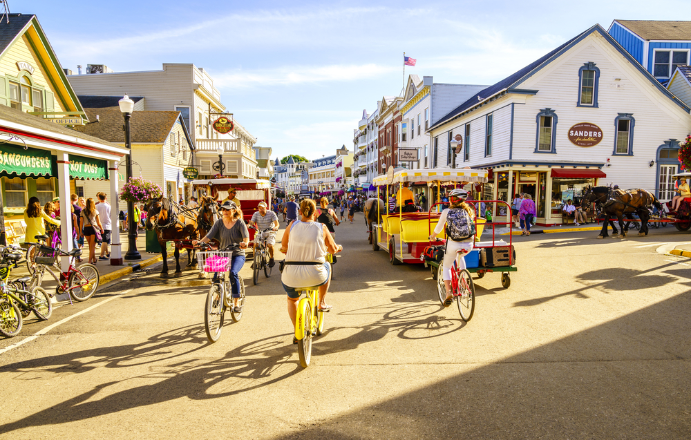 People biking on Mackinac Island in Michigan