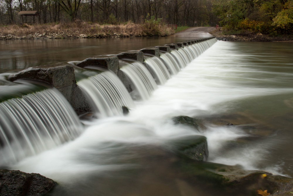 The manmade Pammel Park spillway with water rushing over it