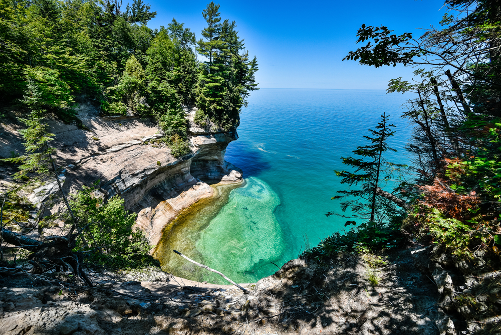 a cliffside at pictured rocks lakeshore weekend getaways in michigan