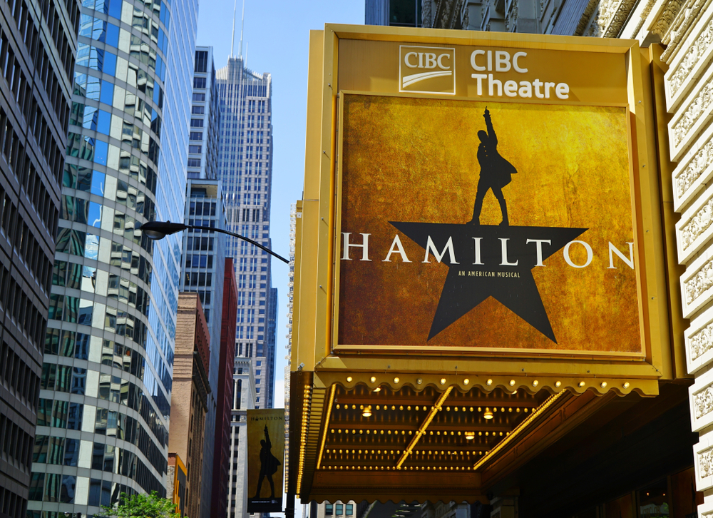 Gold theatre marque featuring 'Hamilton' with gleaming lights. 2 day Chicago itinerary.