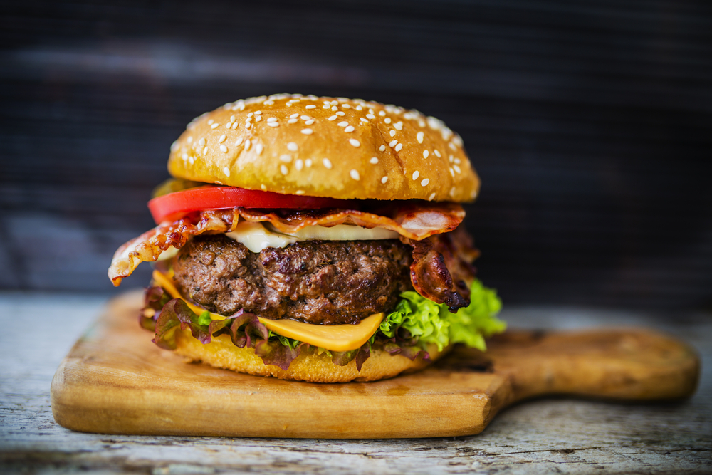 A juicy burger with bacon, cheese, lettuce, tomato restaurants in Cincinnati