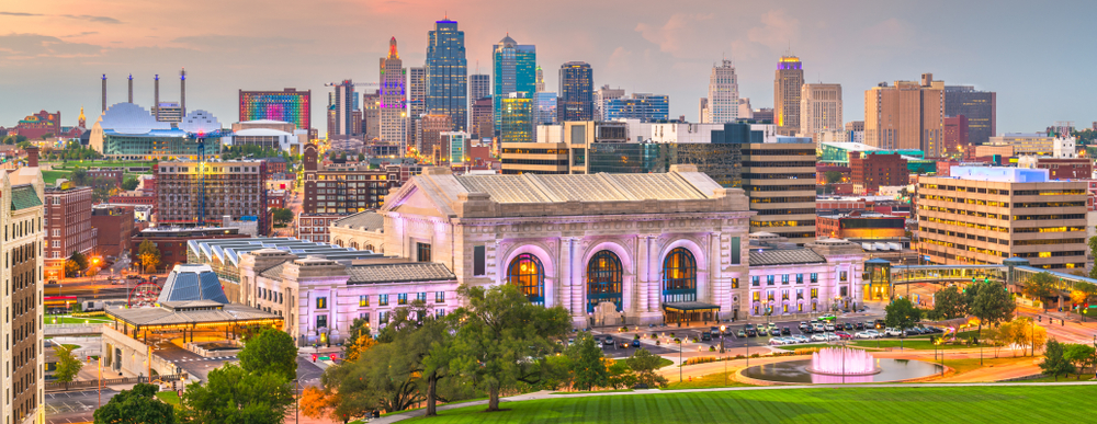 Kansas City Missouri at sunset with buildings lit up