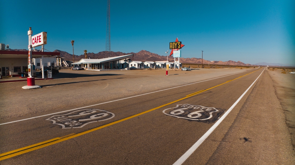 old historic Route 66 and "Roy's" gas station, Americana. Article is about Route 66 attractions.