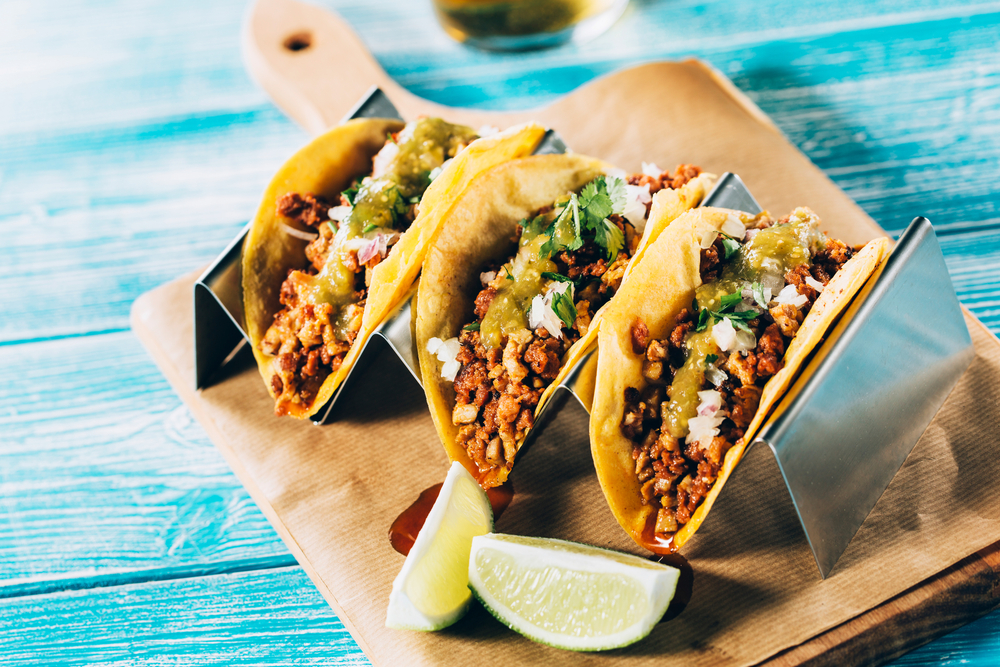 A plate of fresh corn tortillas stuffed with meat and toppings restaurants in Cincinnati