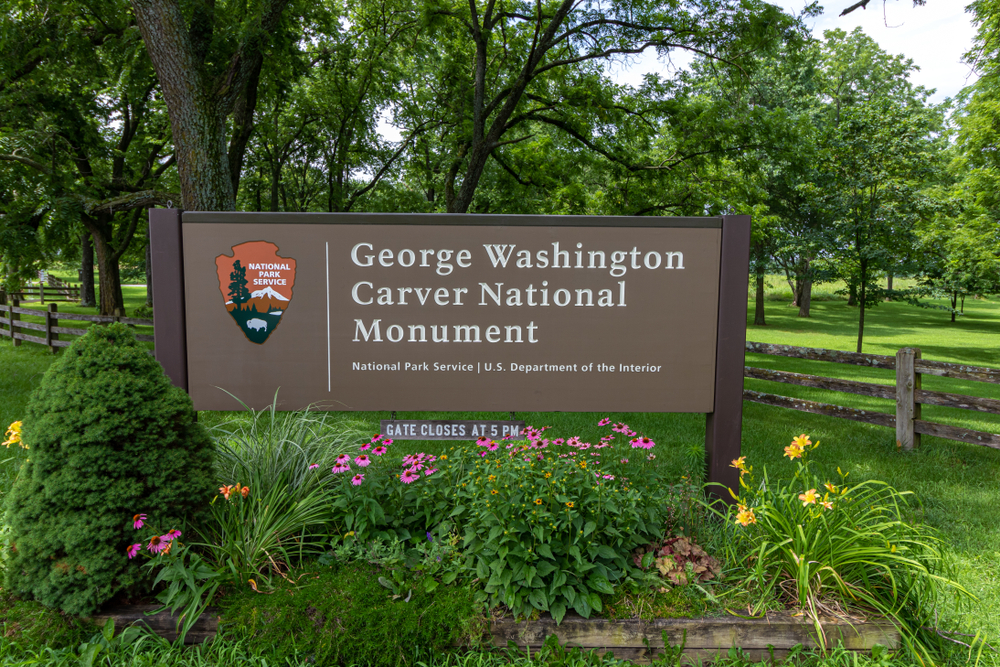 Brown sign of the George Washington Carver historic site with white letters. things to do in Missouri