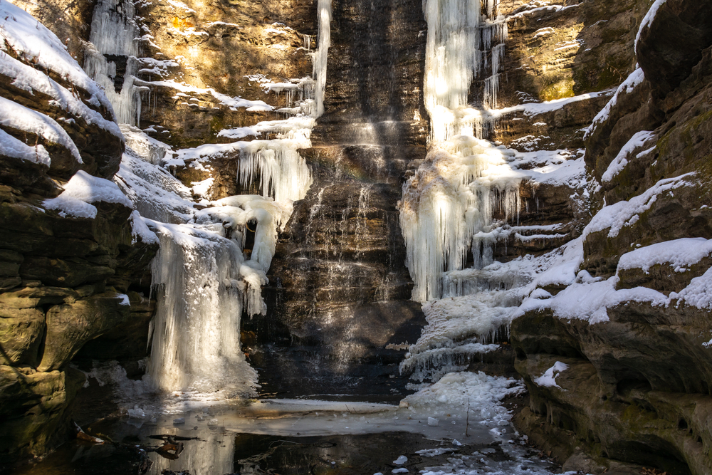 Frozen water on the side of a cliff. The Frozen Bathtub waterfall