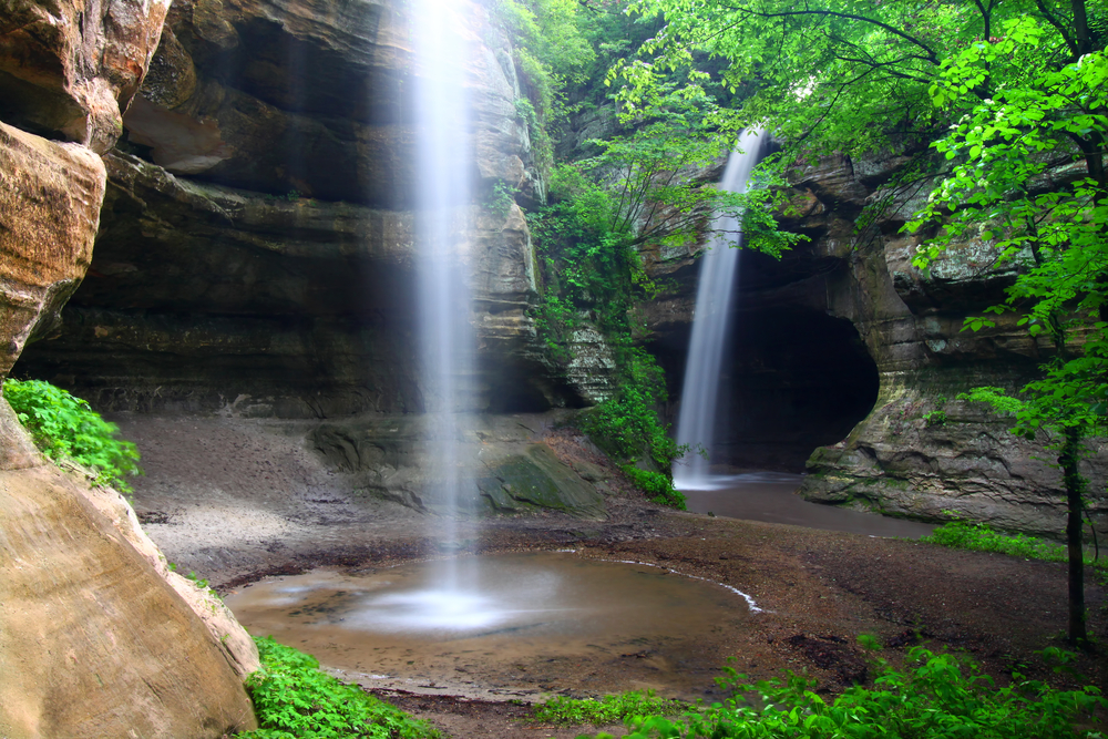 Two waterfalls falling into a canyon. This is the stunning Tonti canyon one of the waterfalls in Illinois