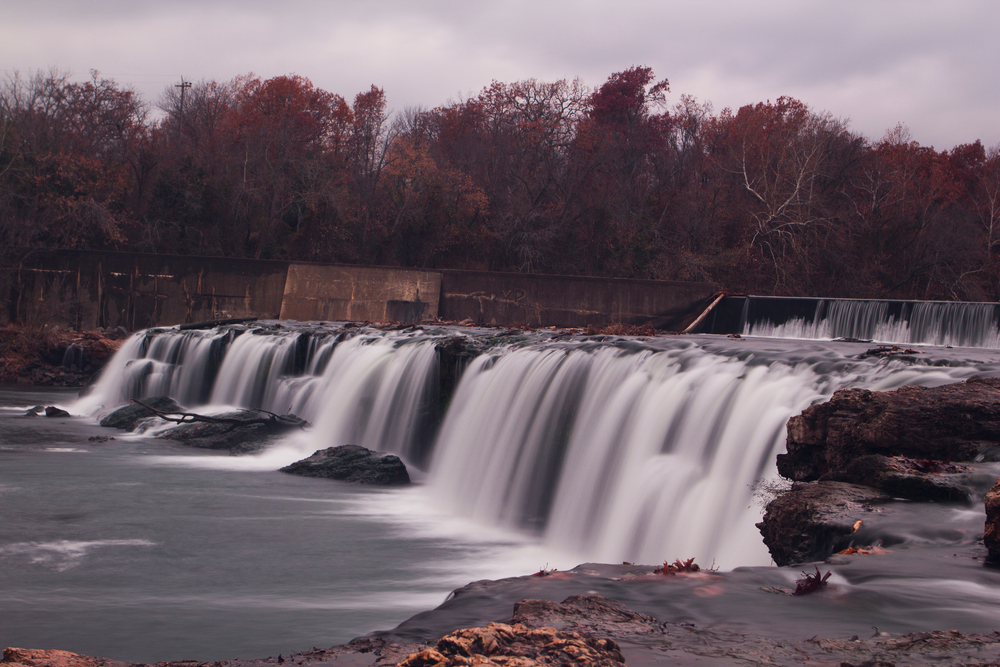 Very wide waterfalls  flowing over craggy rocks that  drop into river below. Best waterfalls in Midwest.