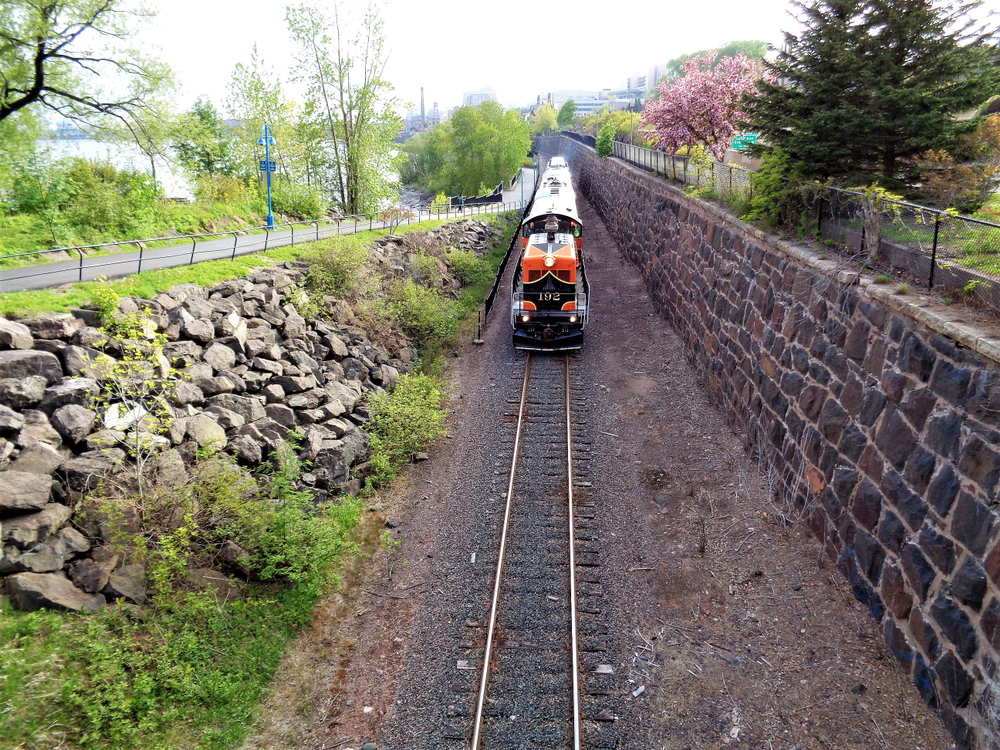 An old train on the track in a deep embankment