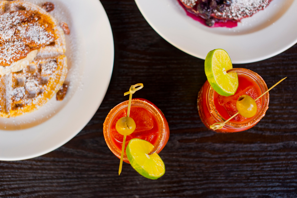 Waffles and cocktails on a table