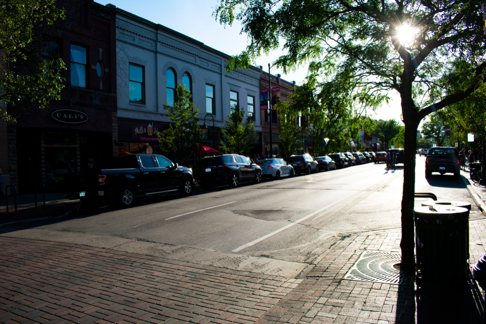 A street in a town with old buildings up one side. Front Street in Traverse City