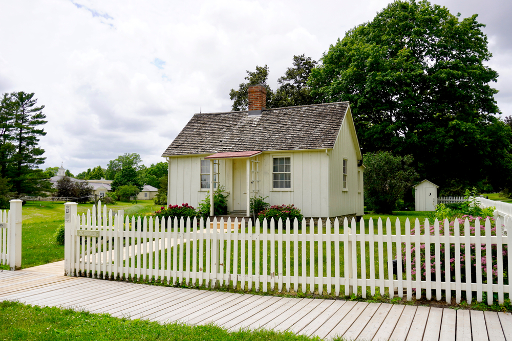 The little, white house and white, picket fence where Herbert Hoover lived as a child.