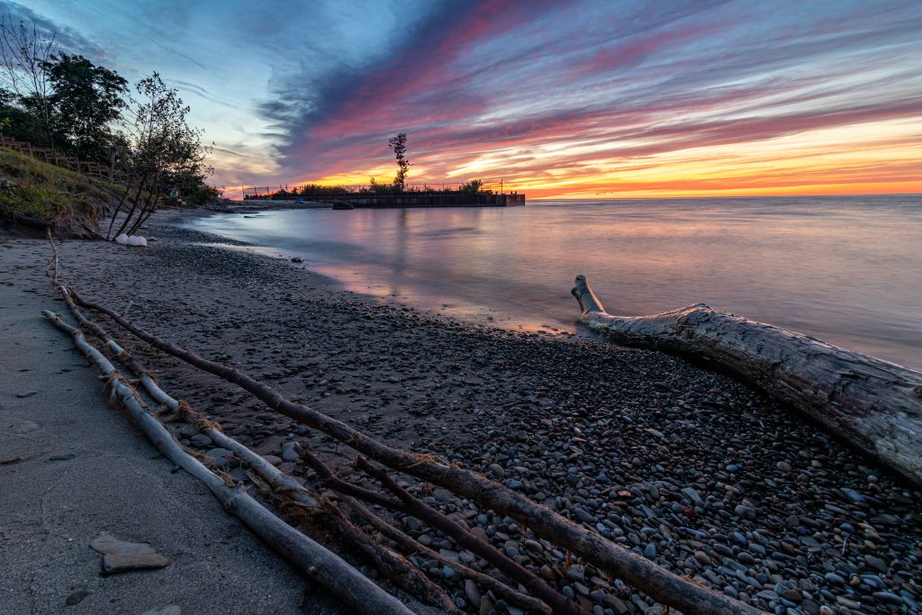 One of the most beautiful beaches in the small Ohio town of Ashtabula. With gorgeous sunset of oranges and yellows.