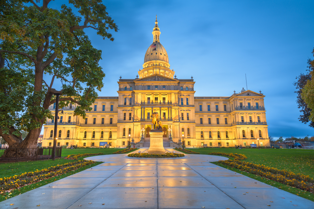 The domed State building at dusk and all lit up