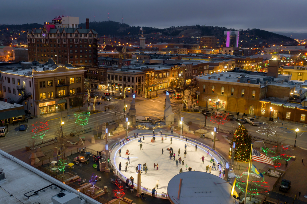 Aerial view of the ice skating rink in downtown Rapid City, showing one of the best things to do in the Midwest for Christmas.