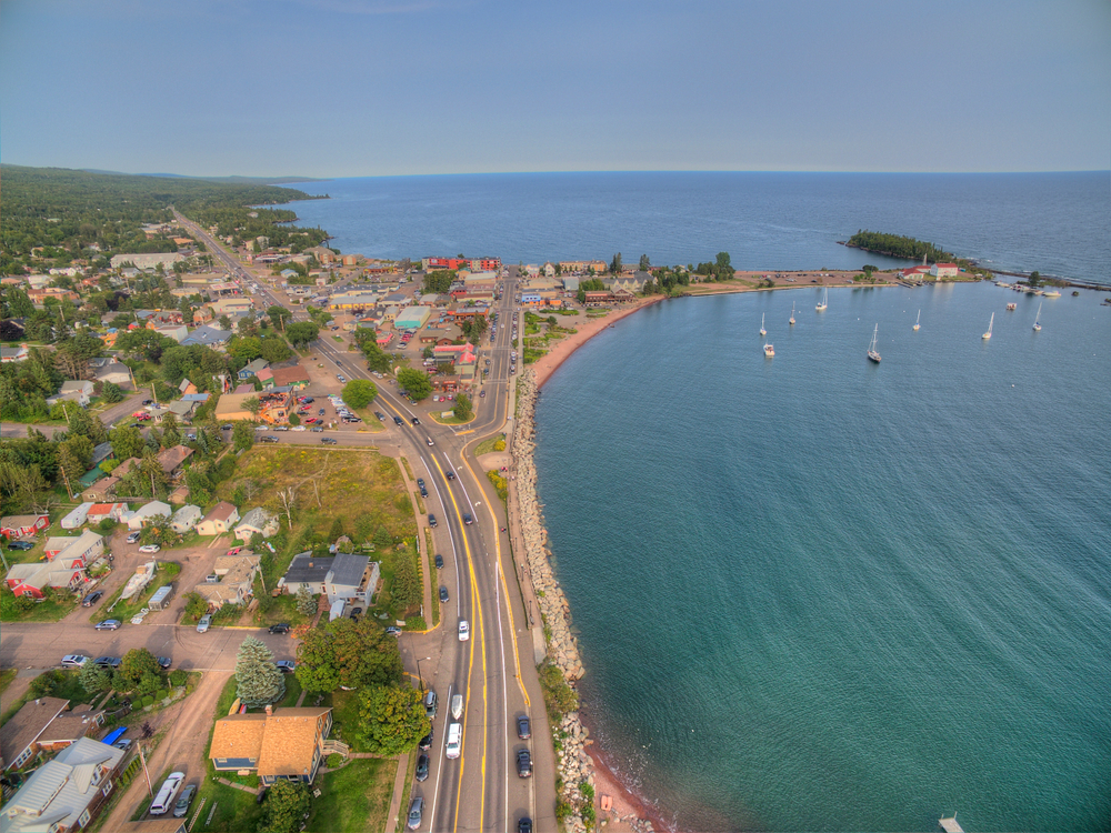 An aerial view of Grand Marais with roads, beach and sea visible.