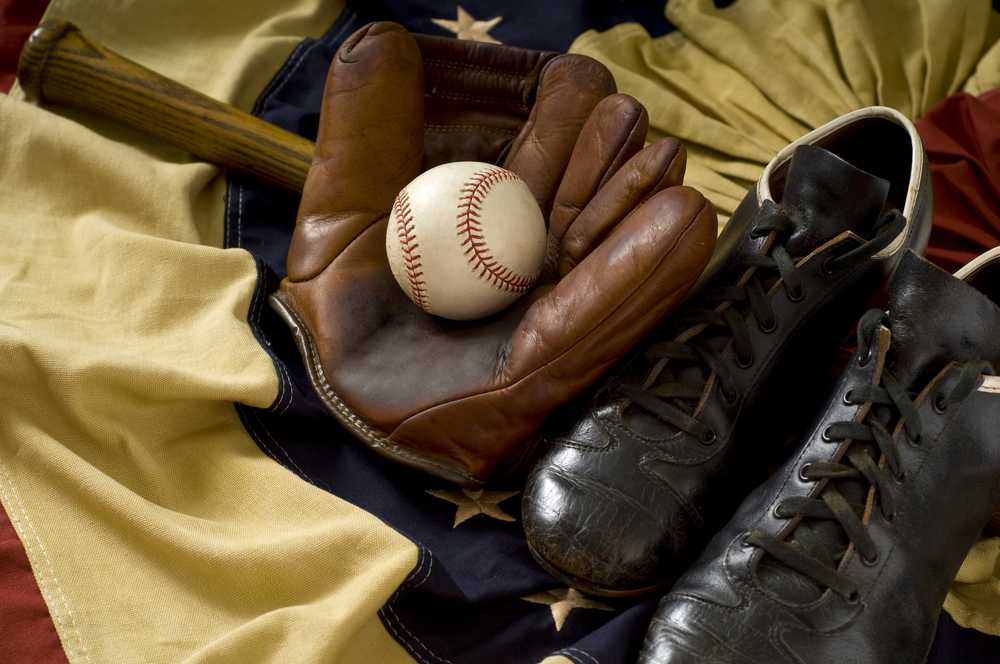 Collection of vintage baseball equipment.