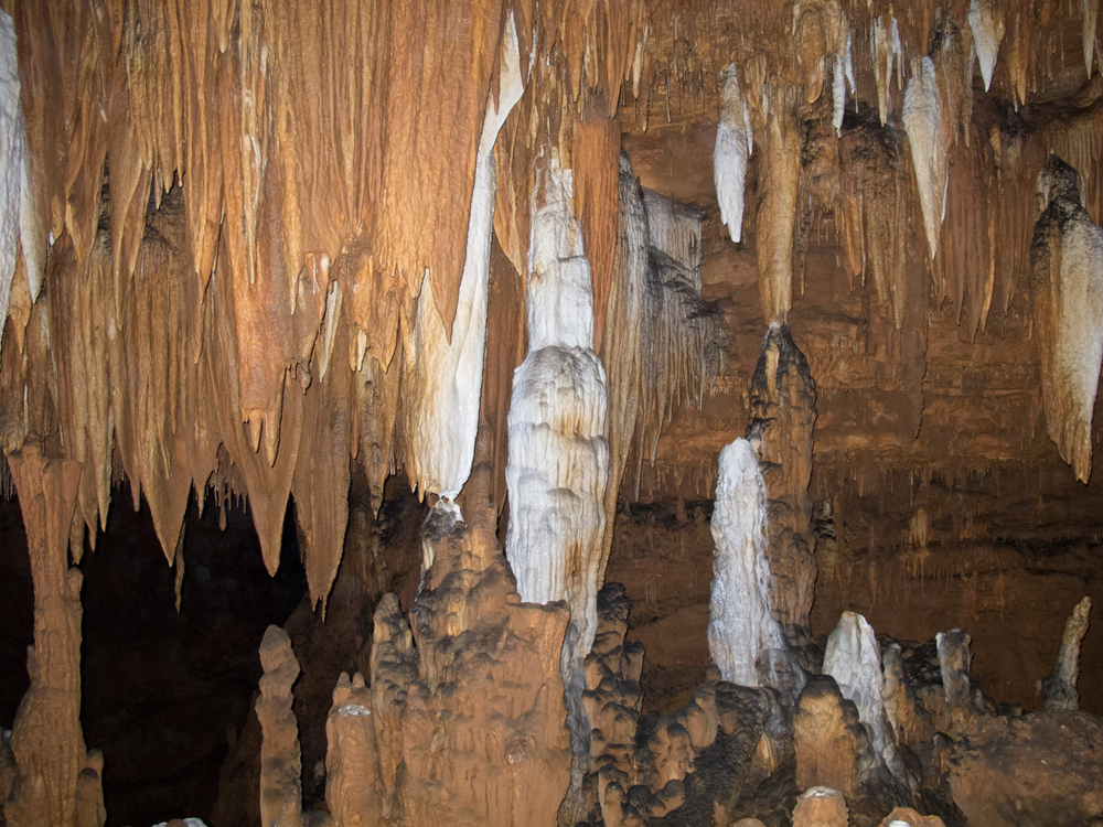 A room of cave formations stalagmites and stalactites
