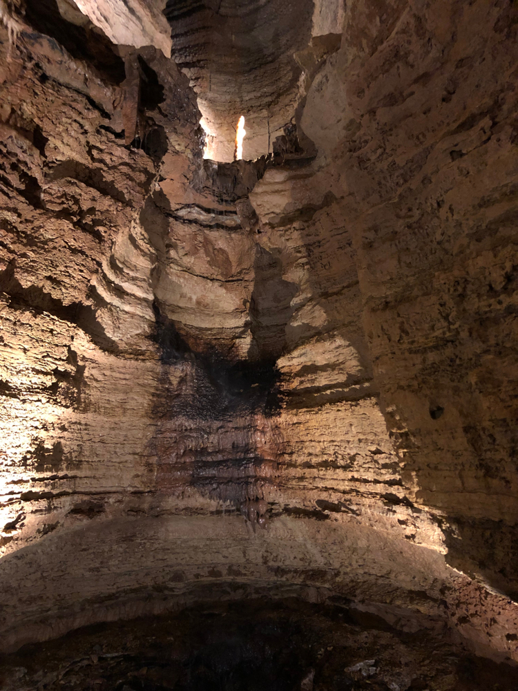 Brown rock formations inside Marvel Caves in Missouri