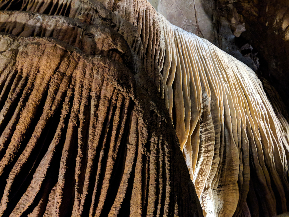 Cave walls with mineral on the wall visiting Talking Rocks Cavern