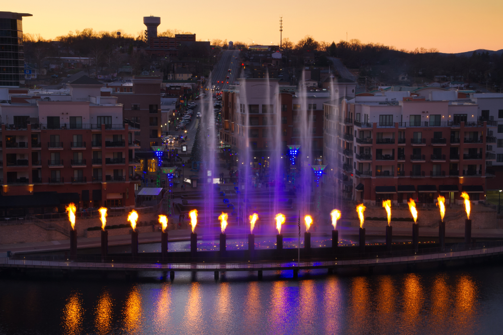 A skyline view of Branson with the fountain and fire show in the foreground one of the things to do in Branson MO