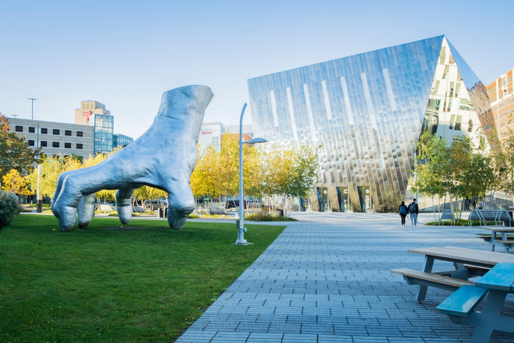 Outside of the Museum of Contemporary Art with a hand sculpture in front.