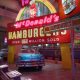 An exhibit at the Henry Ford American Innovation Museum. There is a large McDonalds neon sign, an old Cadillac car, a root beer sign, a stained glass White Castle sign, and tons of other stuff. Its one of the best things to do in Detroit.