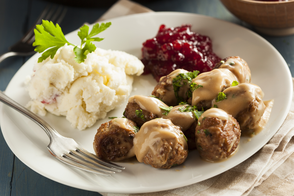 Swedish meatballs with mashed potatoes and sauce on aplate in an article about restaurants in Door County