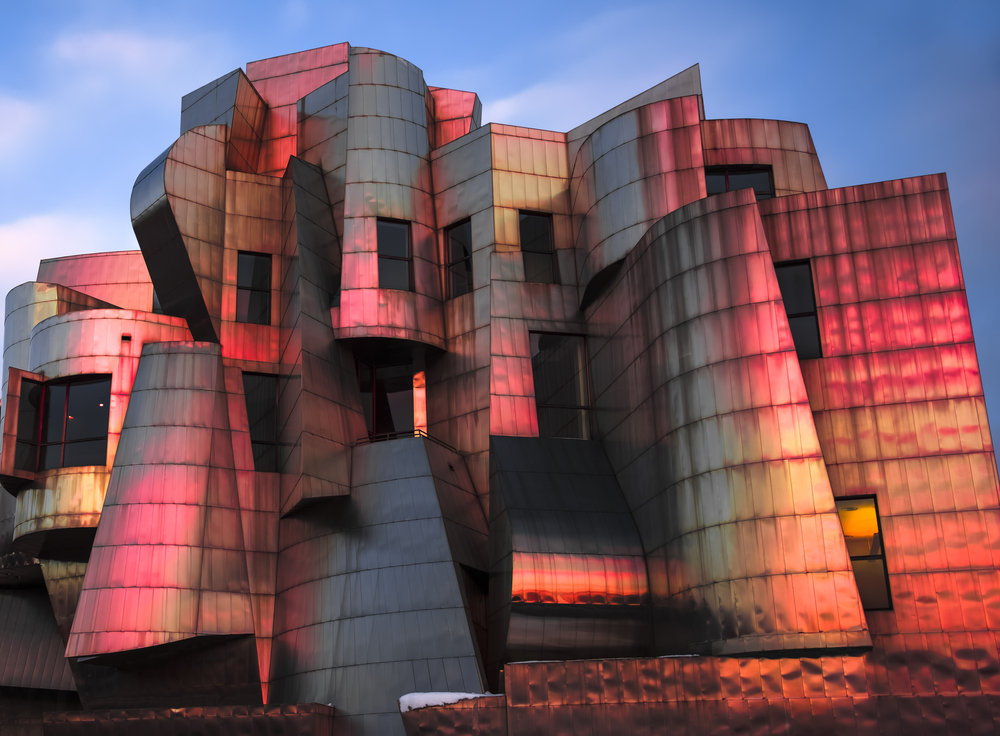 The Weisman Art Museum reflecting pinks and oranges at sunset
