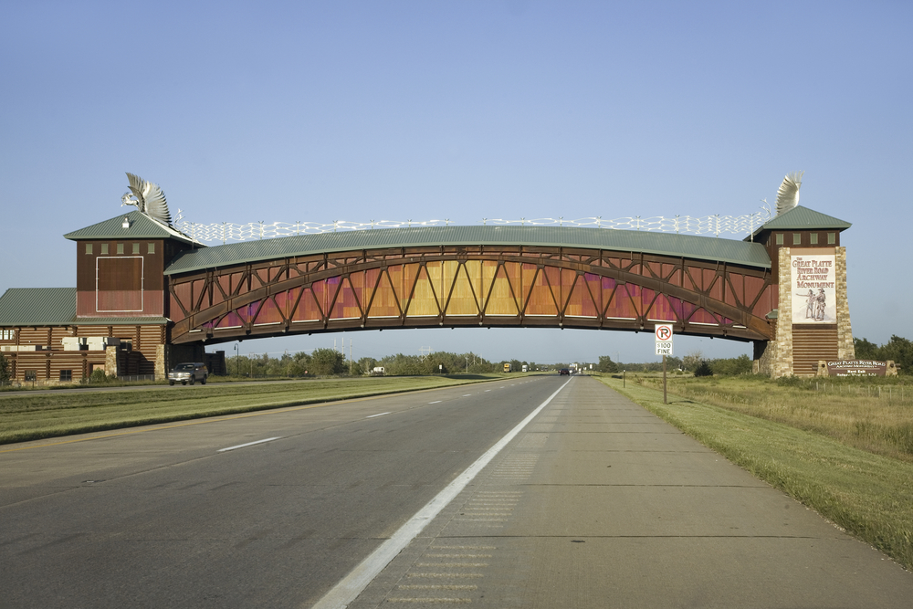 An Archway connecting two buildings on a road