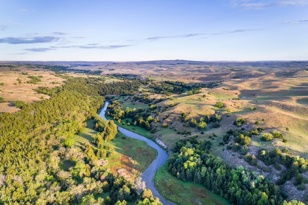 River flowing through a green valley