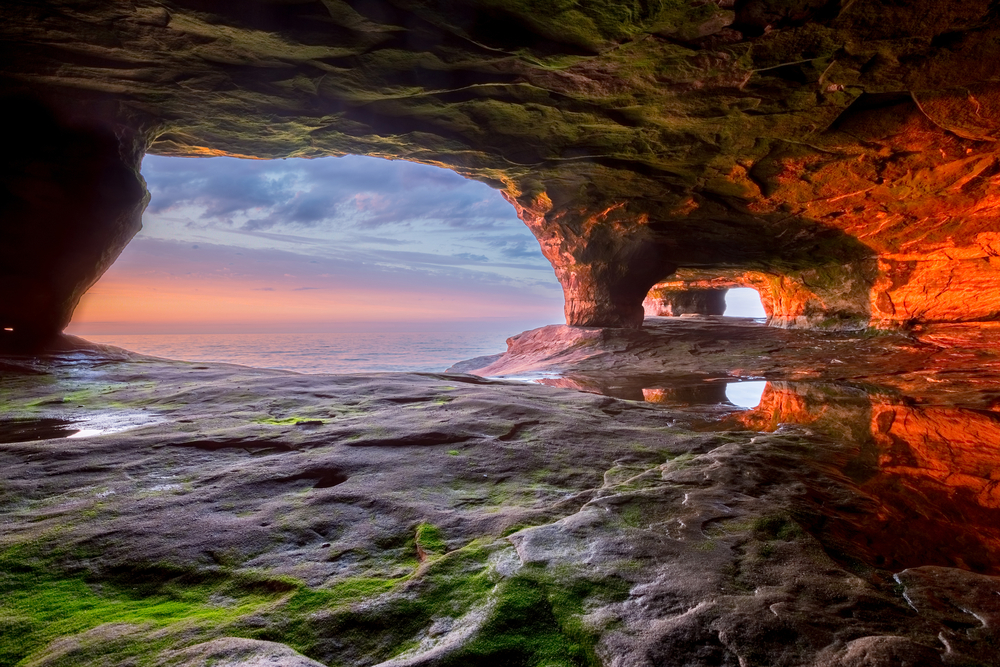 A cave at the Pictured Rocks National Lakeshore at sunset.