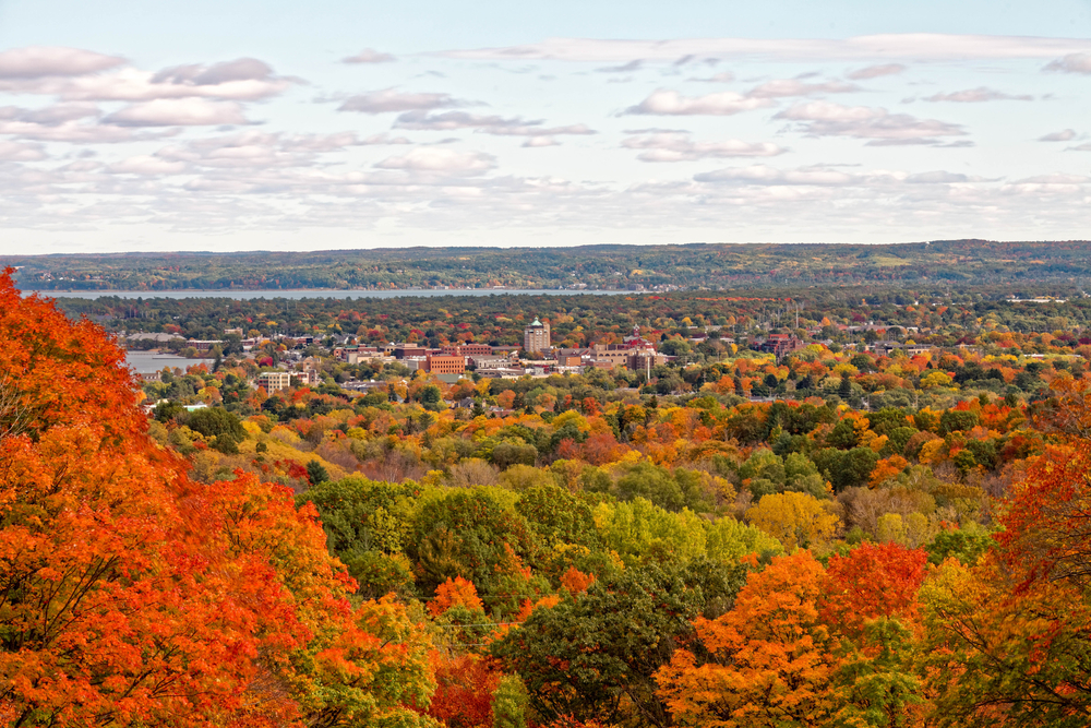 View of Traverse City surrounded by fall foliage.