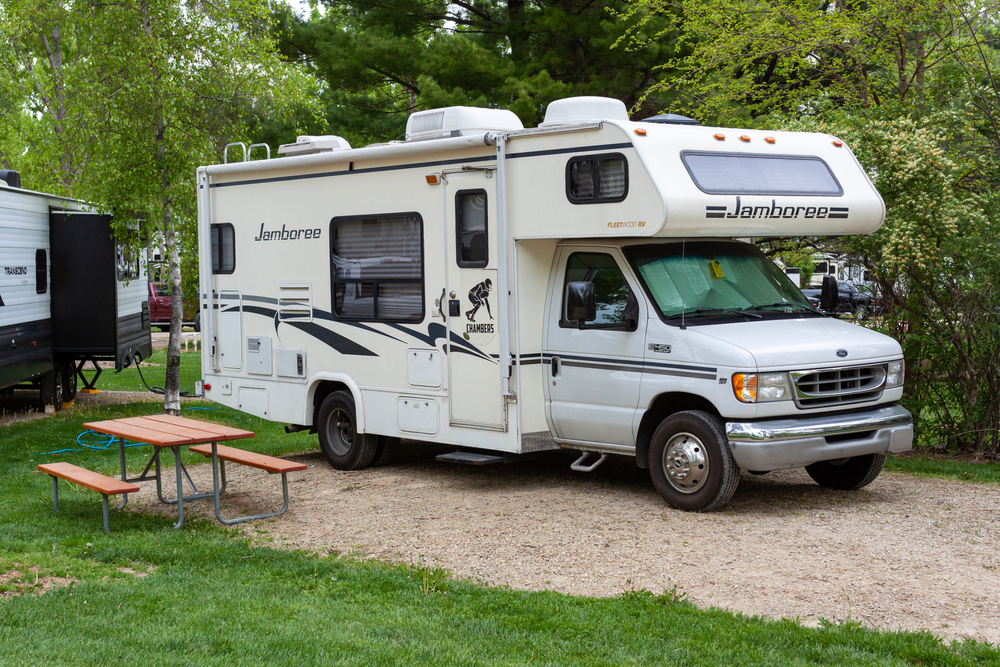 RVs in a campground with picnic table camping in wisconsin
