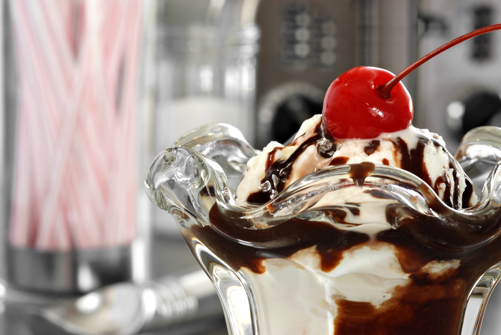 A hot fudge sundae with a cherry on the top