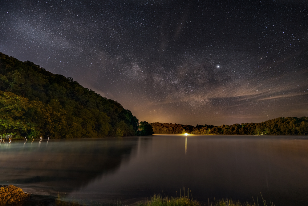night sky over a lake surrounded by hills places to visit in ohio