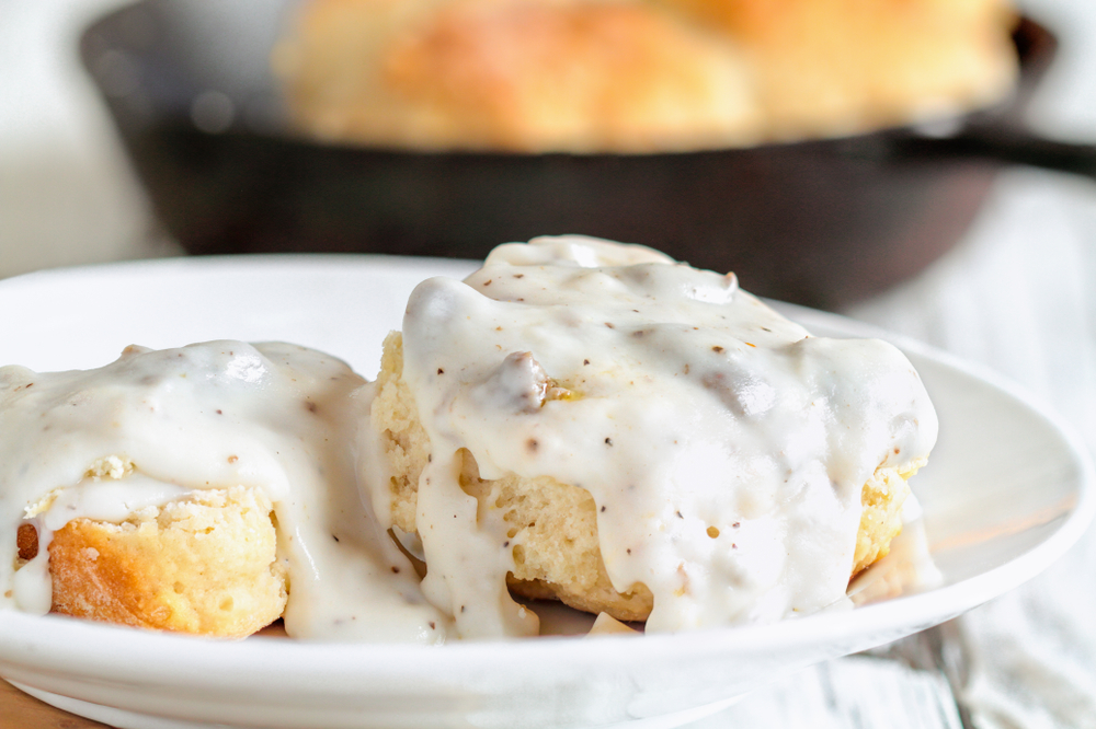 Biscuits covered in gravy on a plate in an article about restaurants in Springfield MO